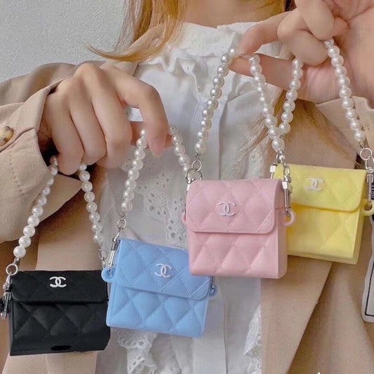 A series of protective AirPods cases in various colors including black, blue, pink, yellow, and white, each featuring a 3D Pikachu design.