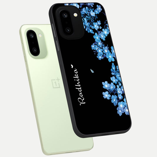 Blue Petal Dream Custom Name phone case For Oneplus 15R showing premium glass back cover with detailed artwork