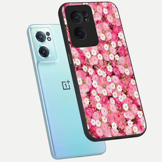 Pink Daisy Bliss phone case For Oneplus Nord CE2 showing premium glass back cover with detailed artwork