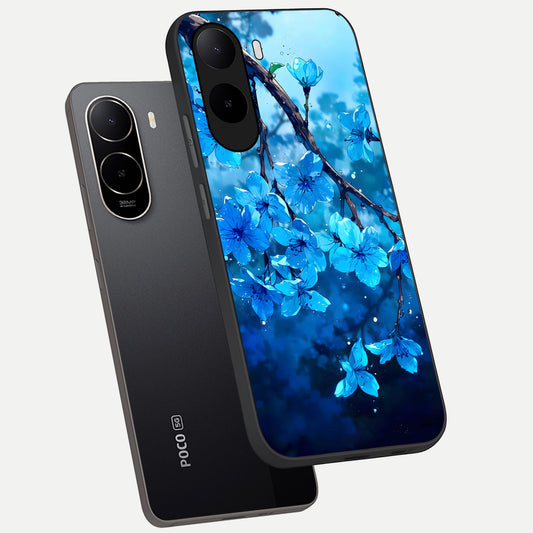 Blue Blossoms Branch phone case For Poco C85x showing premium glass back cover with detailed artwork