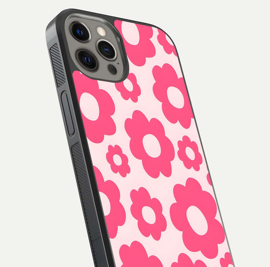 Blush Flower Pop iPhone 12 Pro Max glass phone case angled back view highlighting bright floral pop design and side grip texture