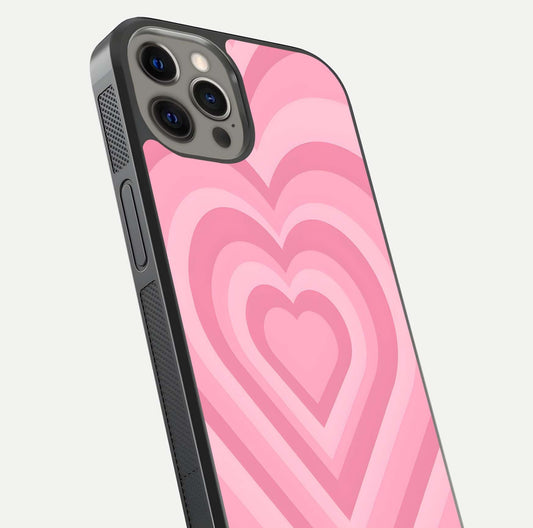 Blush Heart Waves iPhone 12 Pro Max glass phone case angled back view highlighting romantic heart wave artwork and grip texture