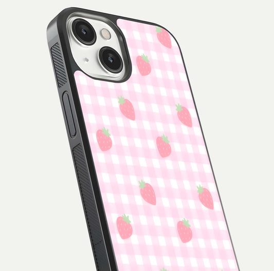 Strawberry Picnic Love iPhone 13 Mini glass phone case angled back view highlighting strawberry illustrations and textured grip