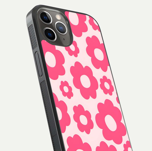 Blush Flower Pop iPhone 13 Pro glass phone case angled back view highlighting bright floral pop design and side grip texture