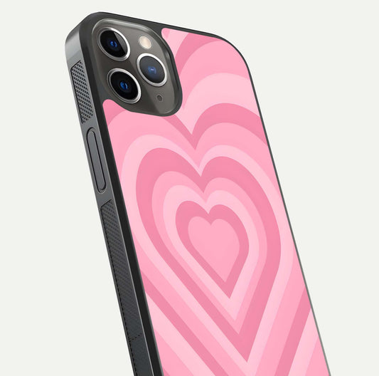 Blush Heart Waves iPhone 13 Pro glass phone case angled back view highlighting romantic heart wave artwork and grip texture