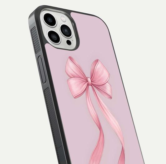 Soft Blush Bow iPhone 13 Pro Max glass phone case angled back view highlighting bow artwork and side grip texture