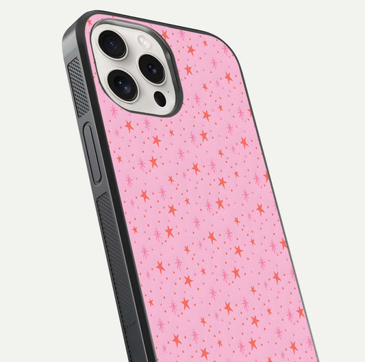 Cosmic Pink Sparkle iPhone 15 Pro Max glass phone case angled back view highlighting sparkling galaxy design and textured side grip