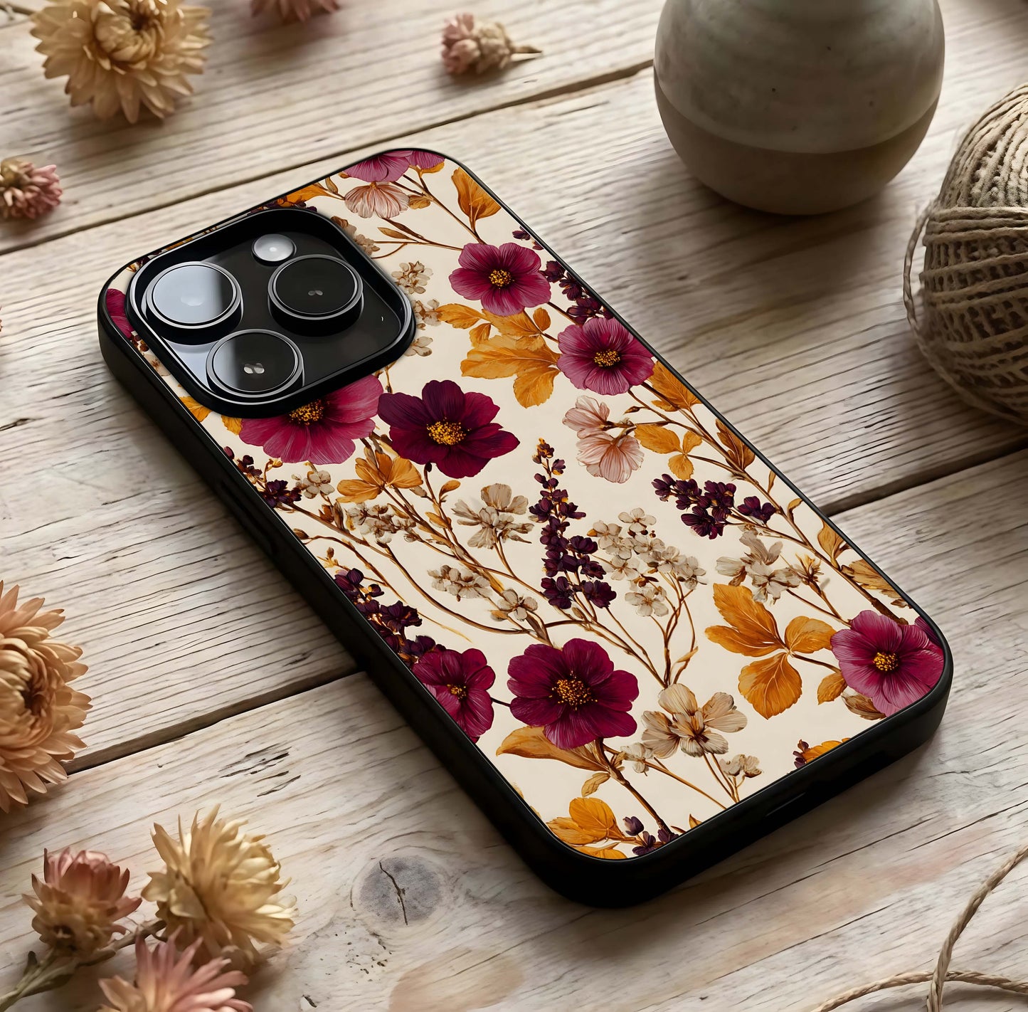Autumn Wine Bloom Glass Case photographed in natural light showing reflective finish and floral depth.