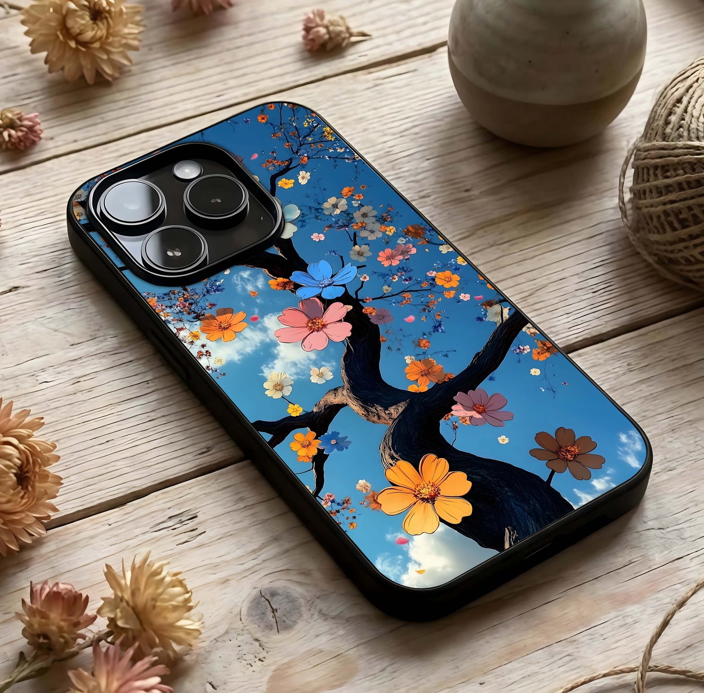 Blossom Dream Sky Glass Case photographed in natural light showing reflective finish and calm depth.