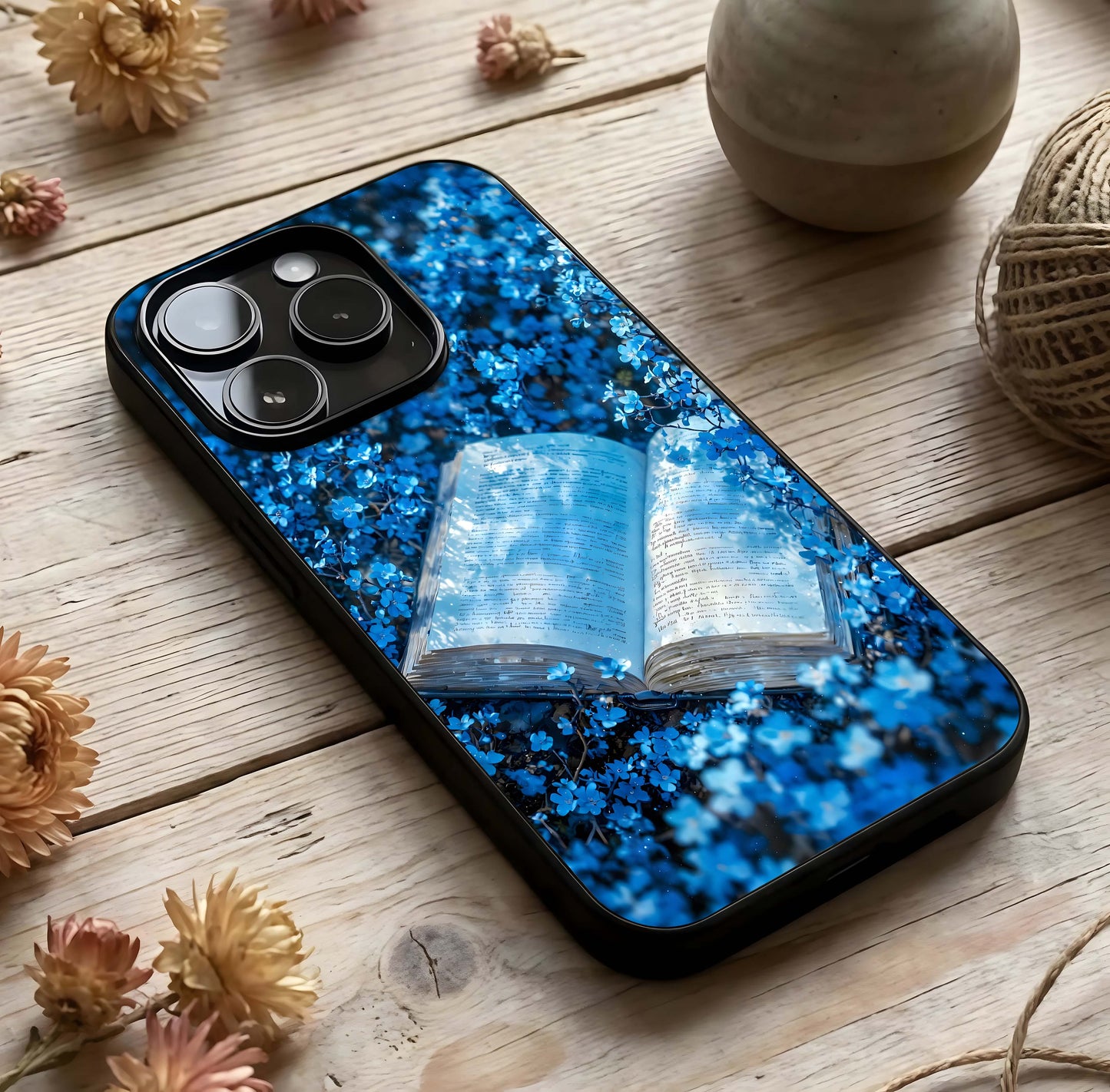 Blue Bloom Tales Glass Case photographed in natural light showing reflective finish and subtle depth.