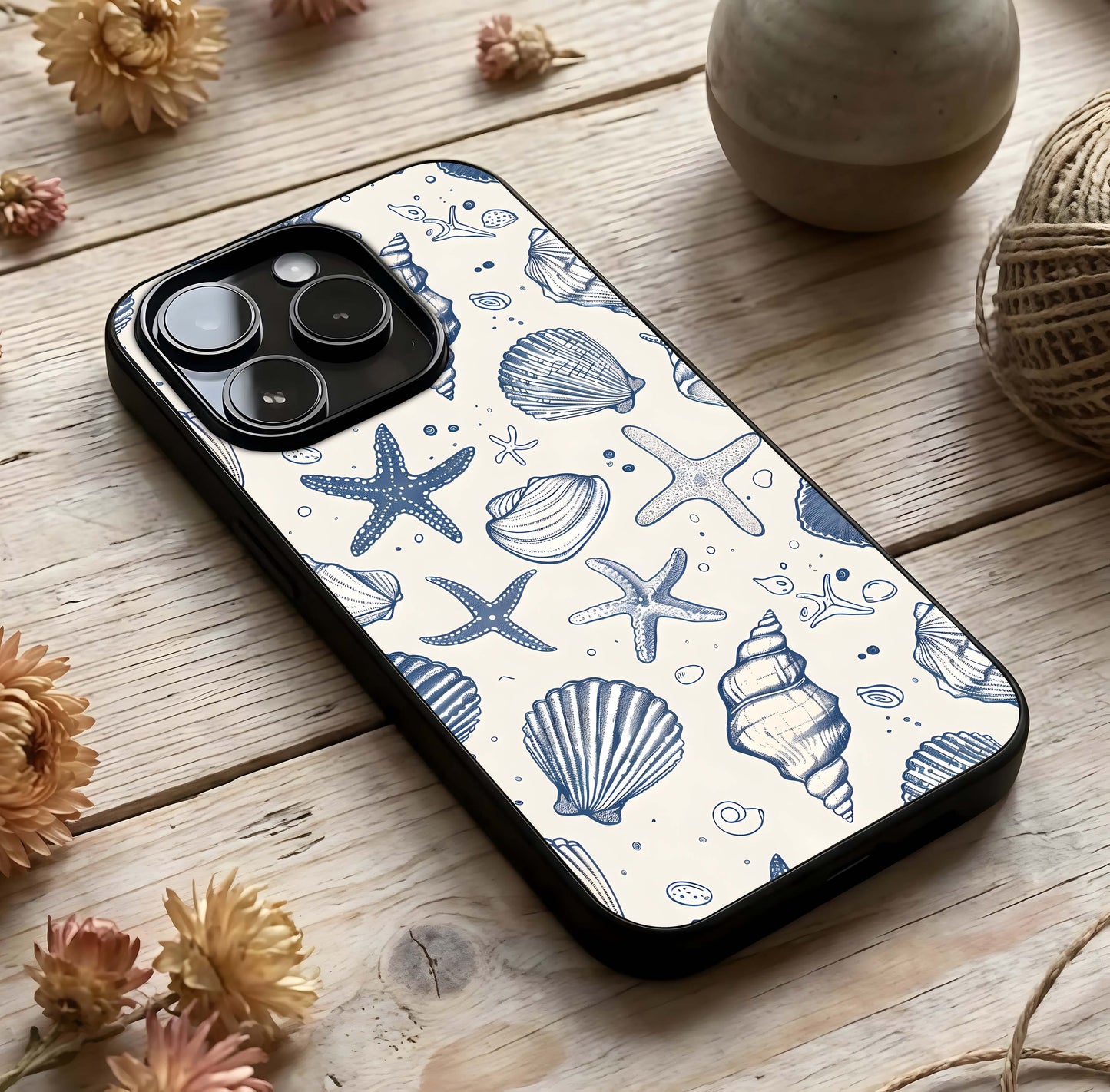 Blue Ocean Outline Glass Case photographed in natural light showing reflective finish and calm depth.
