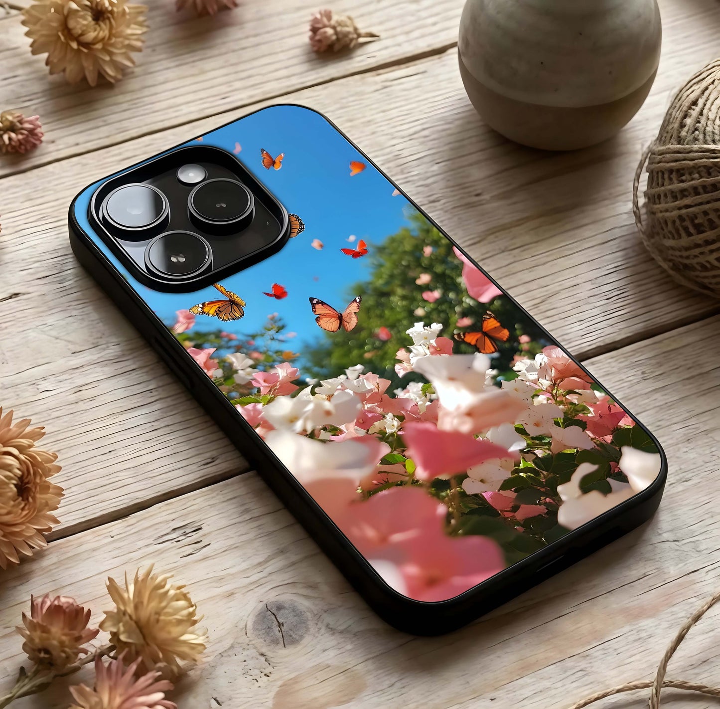 Butterflies in Bloom Sky Glass Case photographed in natural light showing reflective finish and light depth.