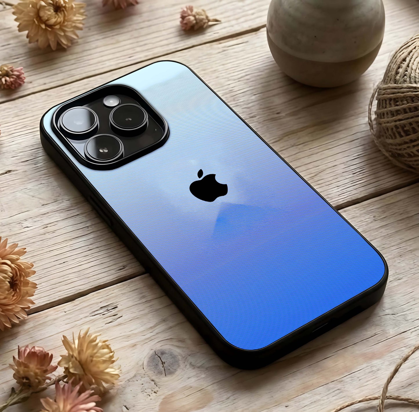 Gradient Apple Vibe Glass Case photographed in natural light showing reflective finish and stylish depth.