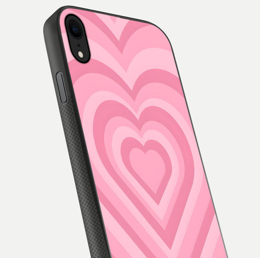 Blush Heart Waves iPhone X glass phone case angled back view highlighting romantic heart wave artwork and grip texture