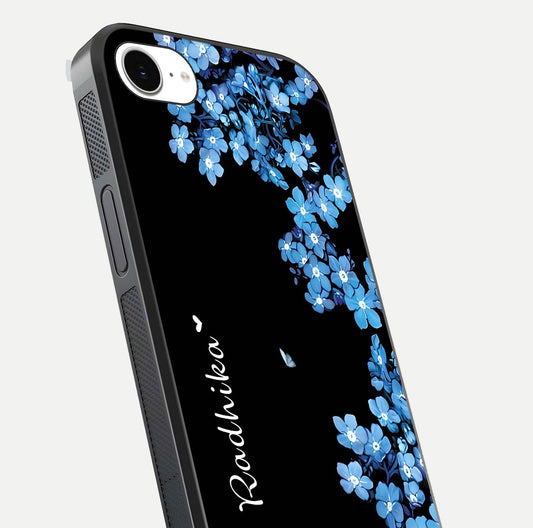 Blue Petal Dream Custom Name Glass Case for iPhone 16e close-up highlighting petal texture and gloss reflection