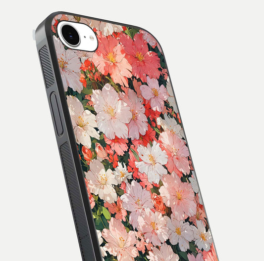Blush Bloom Field Glass Case for iPhone 16e close-up shot capturing pastel flower field tones and gloss shine