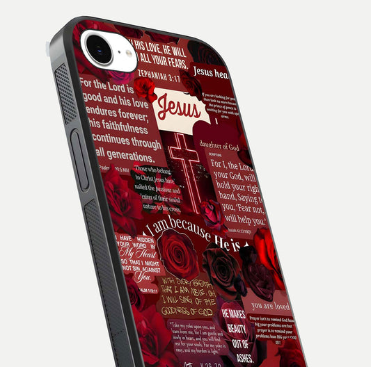 Jesus Love Heals Glass Case for iPhone 16e close-up angled shot showing healing text, cross detailing, and reflection