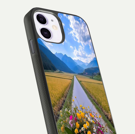Golden Field Journey Glass Case for iPhone 11 close-up angled shot showing sunlight tones and reflection clarity