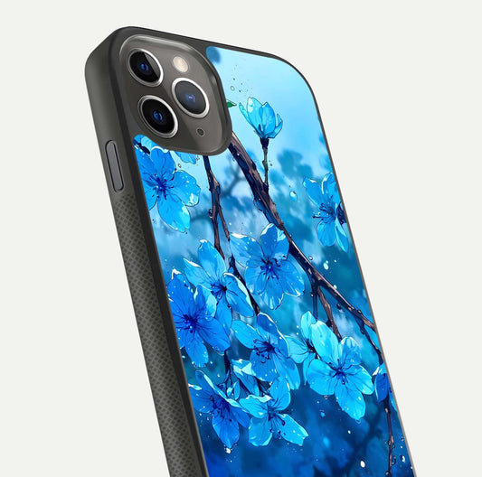Blue Blossoms Branch Glass Case for iPhone 11 Pro Max side-angle image showing blossom pattern flow and glossy texture