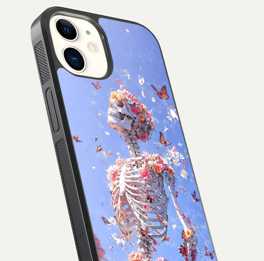 Bloom Beyond Bones Glass Case for iphone-12 close-up highlighting unique bone-floral fusion art and reflection