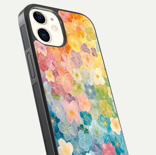 Rainbow Blossom Burst Glass Case for iPhone 12 Mini close-up angled shot showing petal colors and reflection