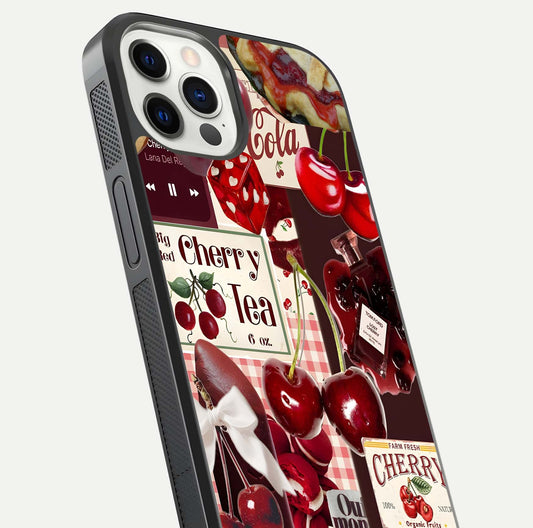 Aesthetic Cherry Tea Glass Case for iPhone 12 Pro close-up angled shot showing detailed cherry artwork, red tones, and gloss reflection