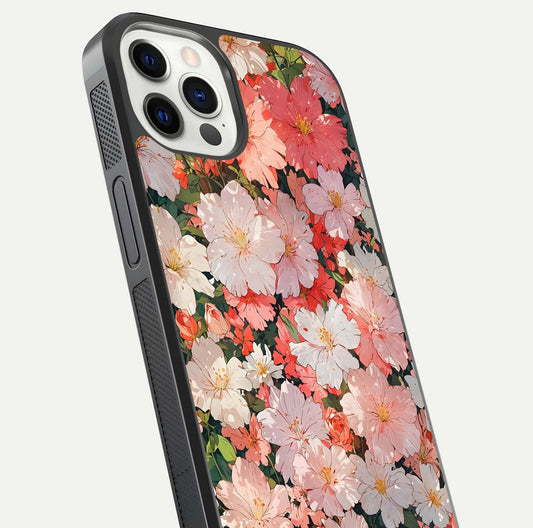 Blush Bloom Field Glass Case for iPhone 12 Pro close-up shot capturing pastel flower field tones and gloss shine