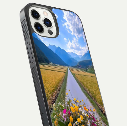 Golden Field Journey Glass Case for iPhone 12 Pro close-up angled shot showing sunlight tones and reflection clarity