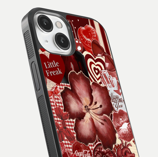 Aesthetic Little Freak Glass Case for iPhone 13 close-up angled shot showing detailed artwork, bold design, and gloss reflection