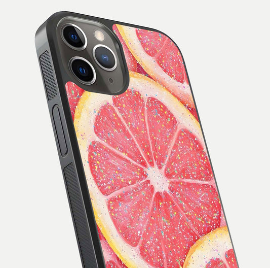 Glitter Grapefruit Glass Case for iPhone 13 Pro close-up angled shot showing fruit texture and glitter reflection