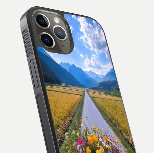 Golden Field Journey Glass Case for iPhone 13 Pro close-up angled shot showing sunlight tones and reflection clarity