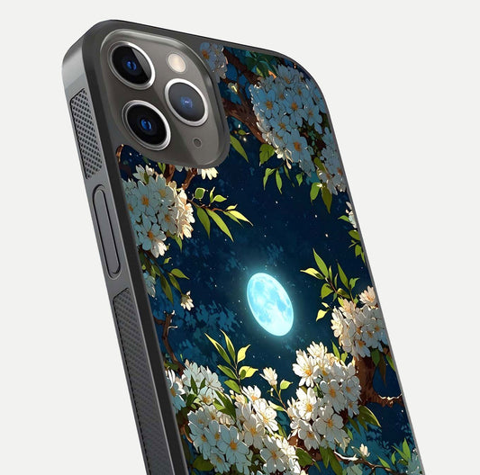 Moonlit Blossom Dream Glass Case for iPhone 13 Pro close-up angled shot showing glowing petals and reflection
