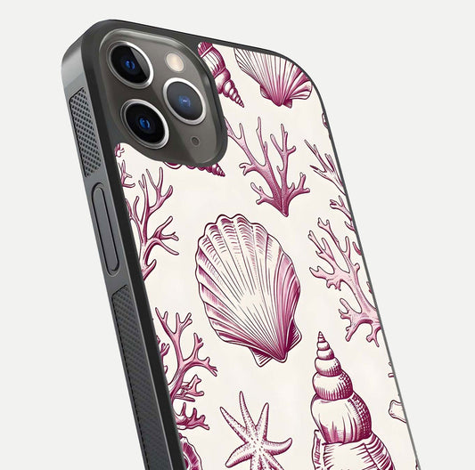 Pink Shells Outline Glass Case for iPhone 13 Pro close-up angled shot showing fine shell lines and reflection