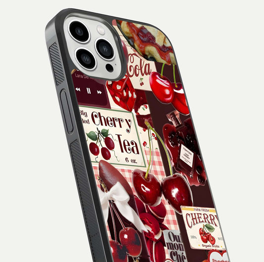 Aesthetic Cherry Tea Glass Case for iPhone 13 Pro Max close-up angled shot showing detailed cherry artwork, red tones, and gloss reflection