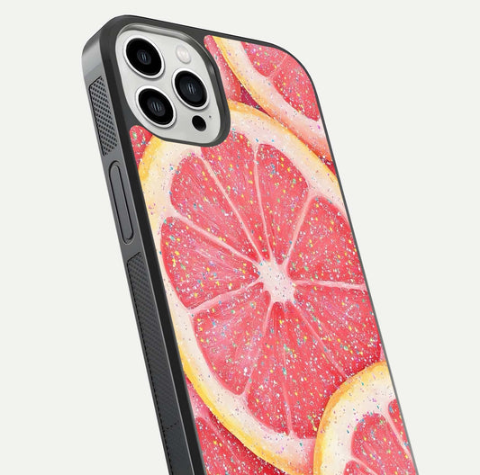 Glitter Grapefruit Glass Case for iPhone 13 Pro Max close-up angled shot showing fruit texture and glitter reflection