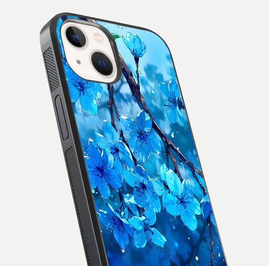 Blue Blossoms Branch Glass Case for iPhone 14 close-up angle highlighting petal details and reflection gloss