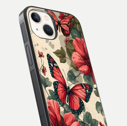 Crimson Butterfly Garden Glass Case for iPhone 14 close-up showing wing detail and reflection shine