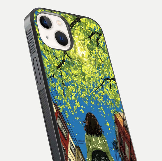 Golden Leaves Glow Glass Case for iPhone 14 close-up angled shot showing fine leaf texture and reflection shine