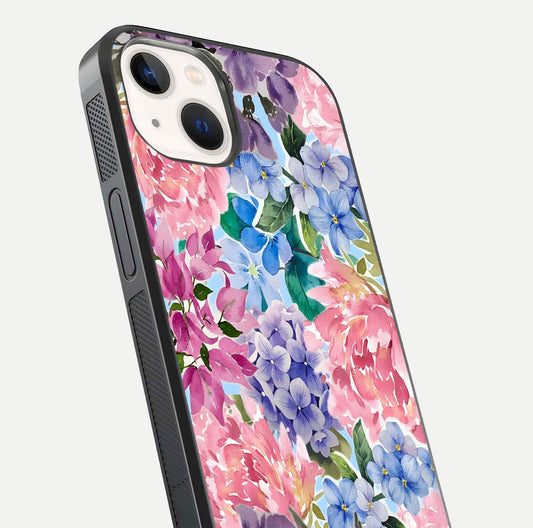 Pastel Floral Mix Glass Case for iPhone 14 close-up angled shot highlighting flower detail and reflection