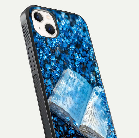 Blue Bloom Tales Glass Case for iPhone 14 Plus close-up angle showing petal texture and blue tone reflection