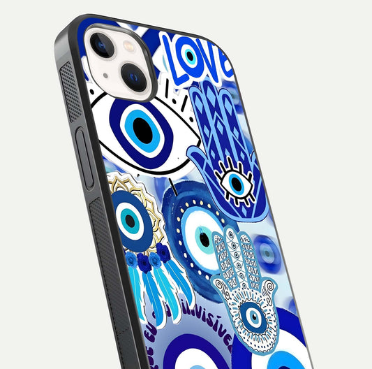 Evil Eyes Dream Glass Case for iPhone 14 Plus close-up highlighting evil-eye charm detail and light reflection on glass
