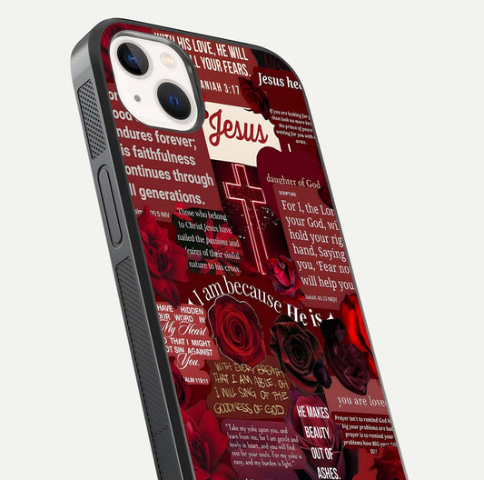 Jesus Love Heals Glass Case for iPhone 14 Plus close-up angled shot showing healing text, cross detailing, and reflection