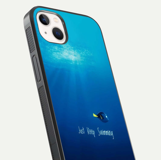 Just Keep Swimming Glass Case for iPhone 14 Plus close-up angled shot showing elegant lettering and blue tone reflection