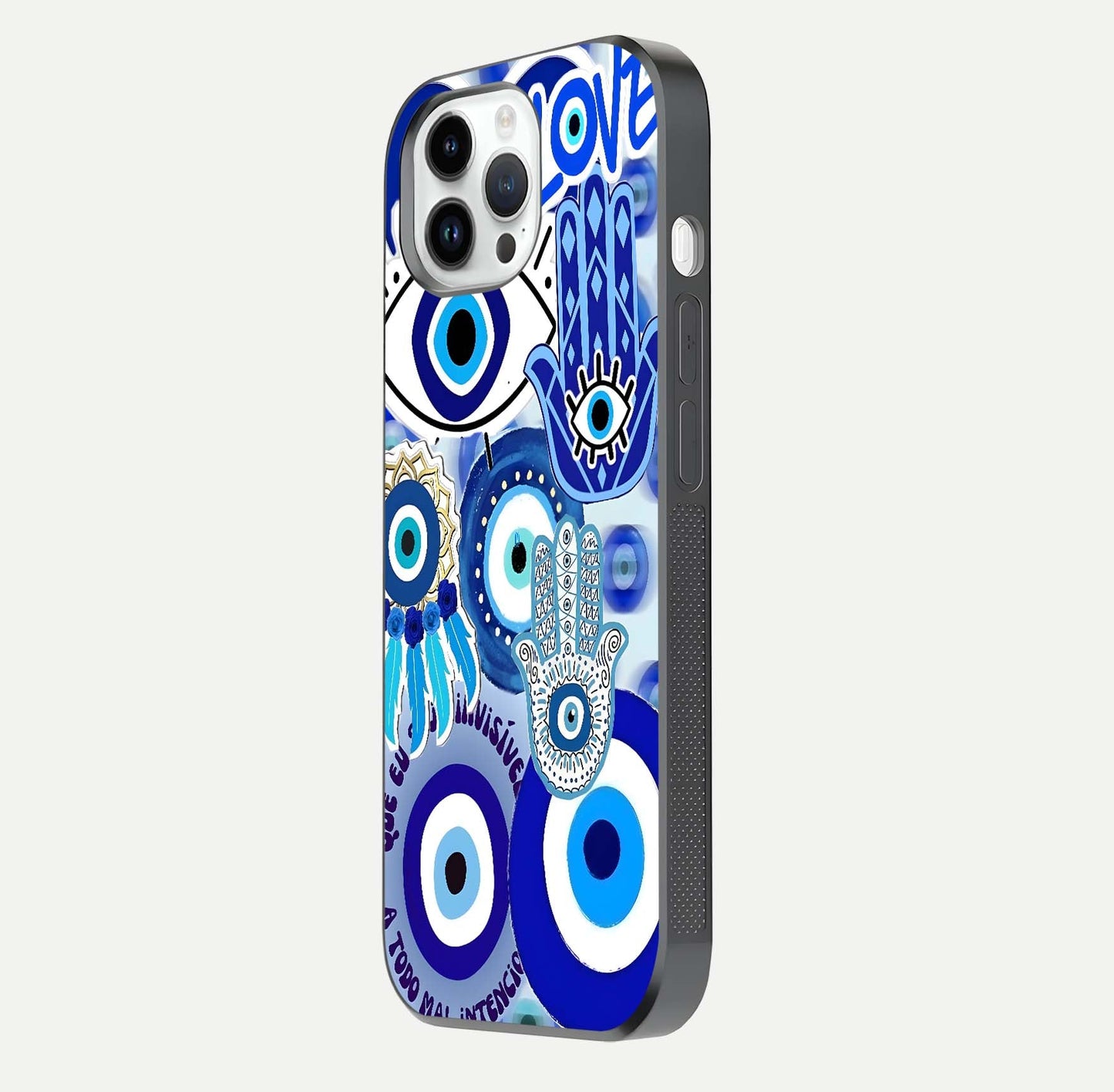 Evil Eyes Dream Glass Case for iPhone 14 Pro side-angle photo capturing smooth edges and reflective texture