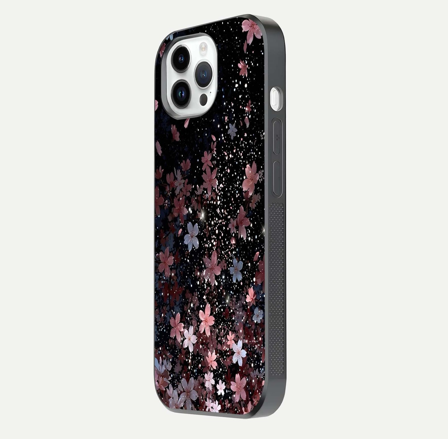 Starlit Flower Dreams Glass Case for iPhone 14 Pro side-angle image showing shine, edge detail, and floral contrast
