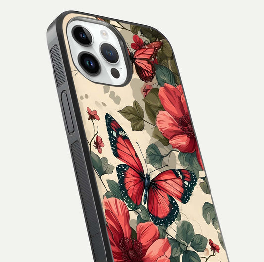 Crimson Butterfly Garden Glass Case for iPhone 14 Pro close-up showing wing detail and reflection shine