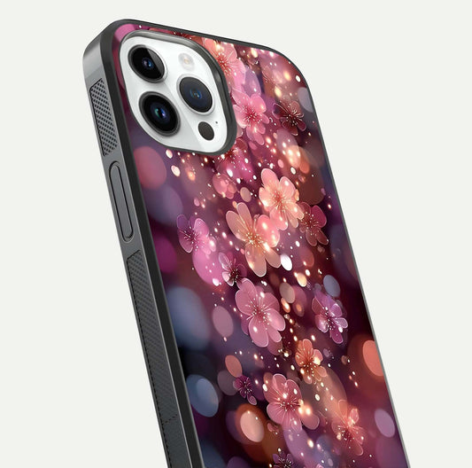 Glowing Petal Bliss Glass Case for iPhone 14 Pro close-up angled shot showing petal glow, color depth, and reflection shine