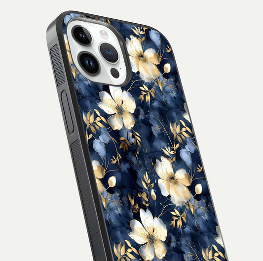 Golden Midnight Bloom Glass Case for iPhone 14 Pro close-up angled shot showing floral detail and reflection shine
