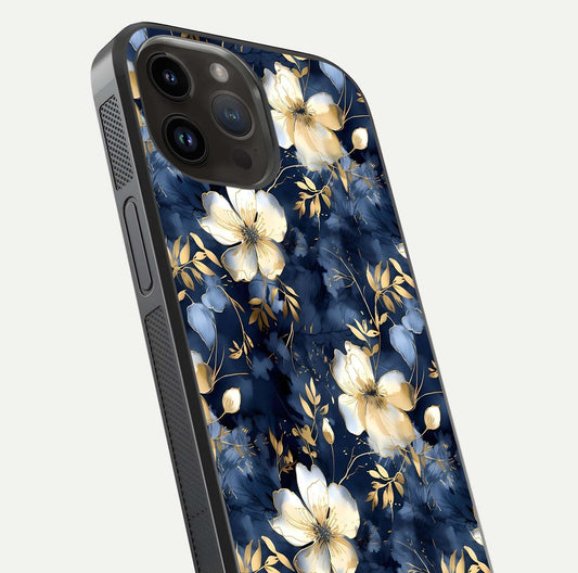 Golden Midnight Bloom Glass Case for iPhone 14 Pro Max close-up angled shot showing floral detail and reflection shine