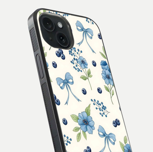 Blue Flower & Bow Glass Case for iPhone 15 close-up shot highlighting ribbon detail and flower gloss finish